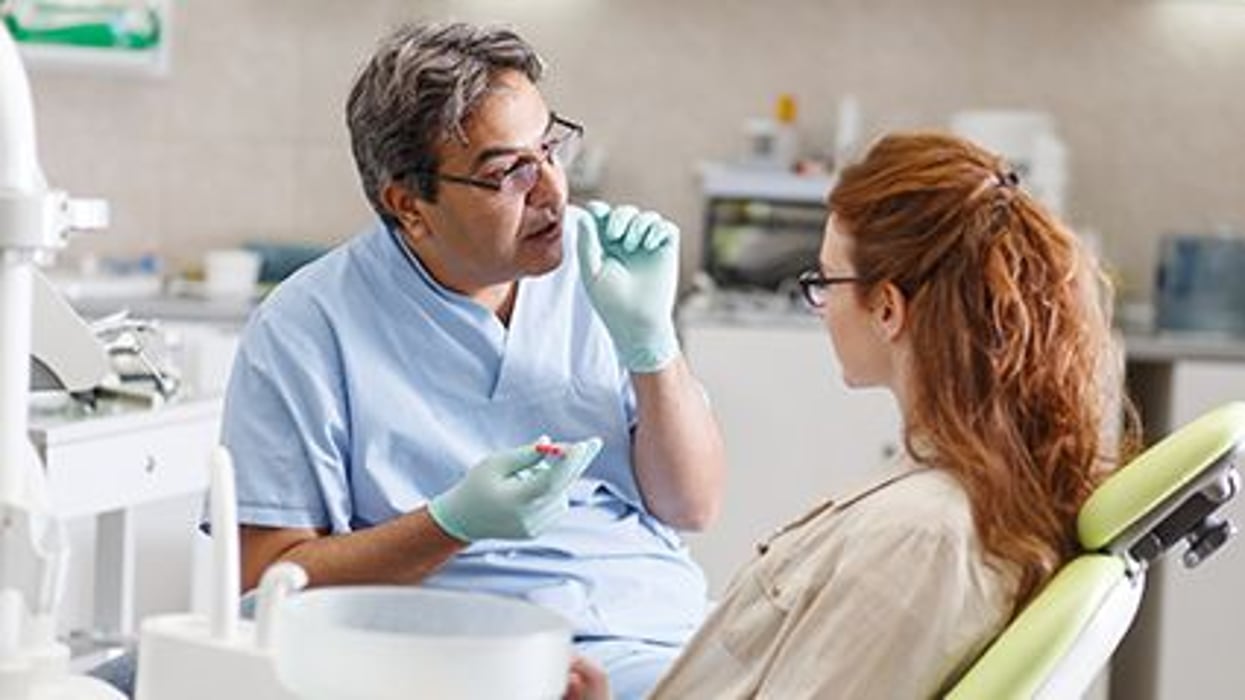 a dentist with a patient