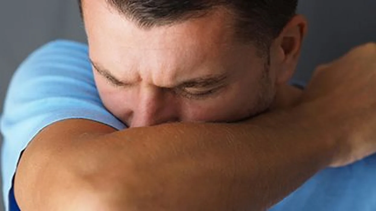 a man sneezing