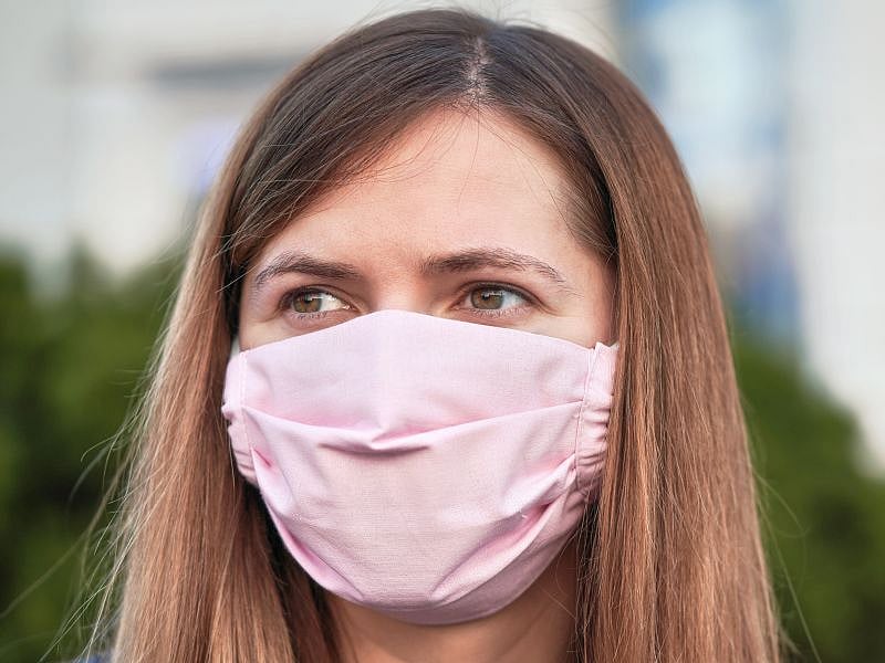 Masks Cut Distance Coronavirus Travels in Half, Study Finds