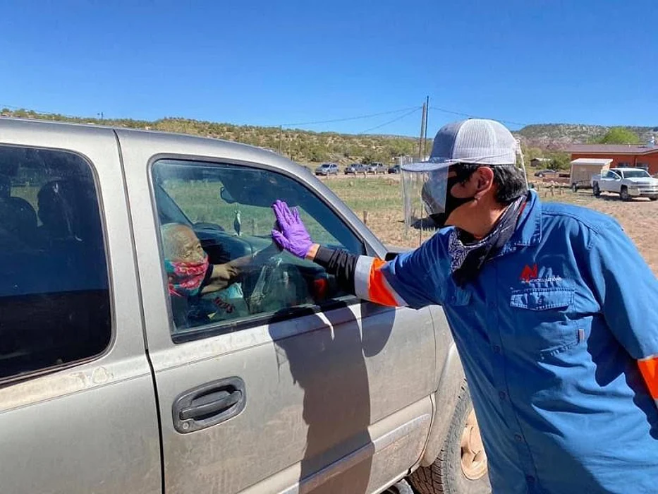 Pres. Jonathan Nez of Navajo Nation distributes food