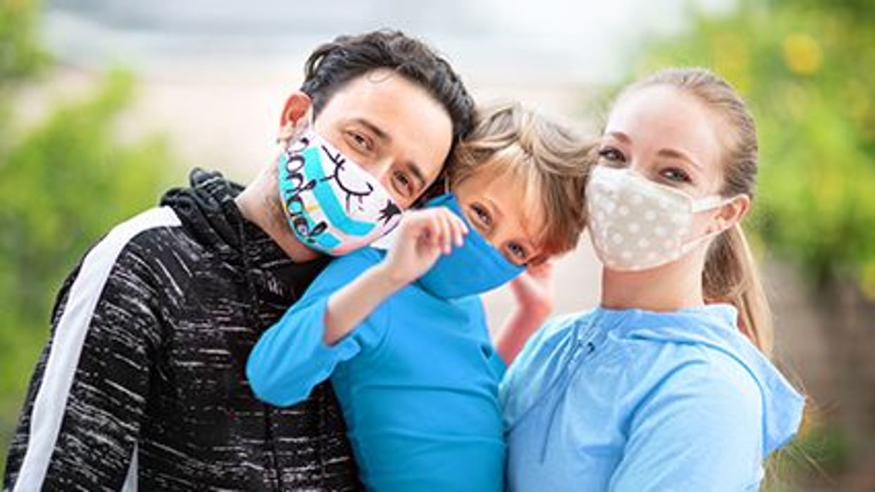 family in face masks