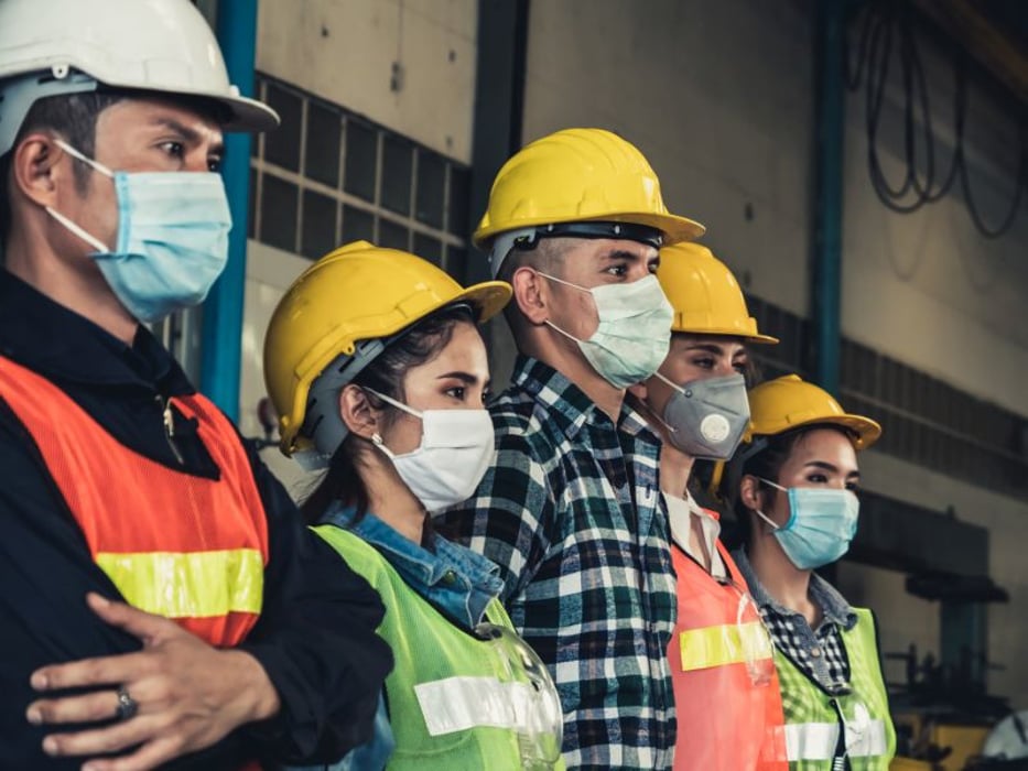factory workers wearing masks