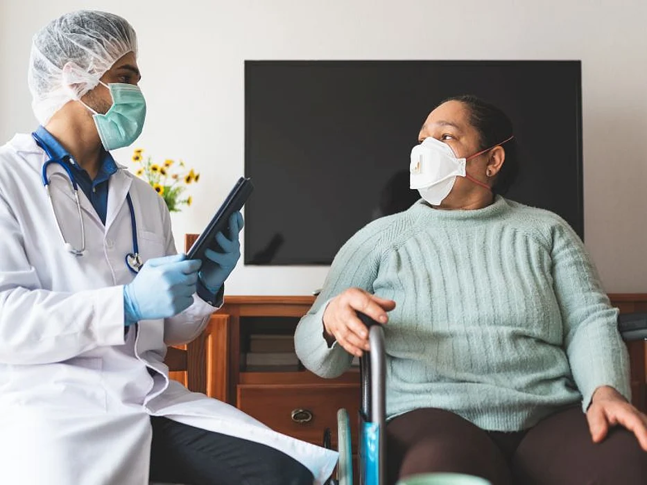 hispanic doctor and patient