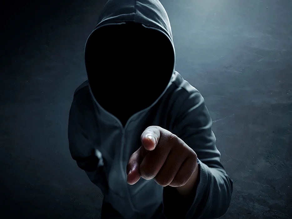 Hacker alone in dark room