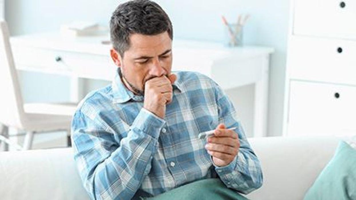 a man coughing