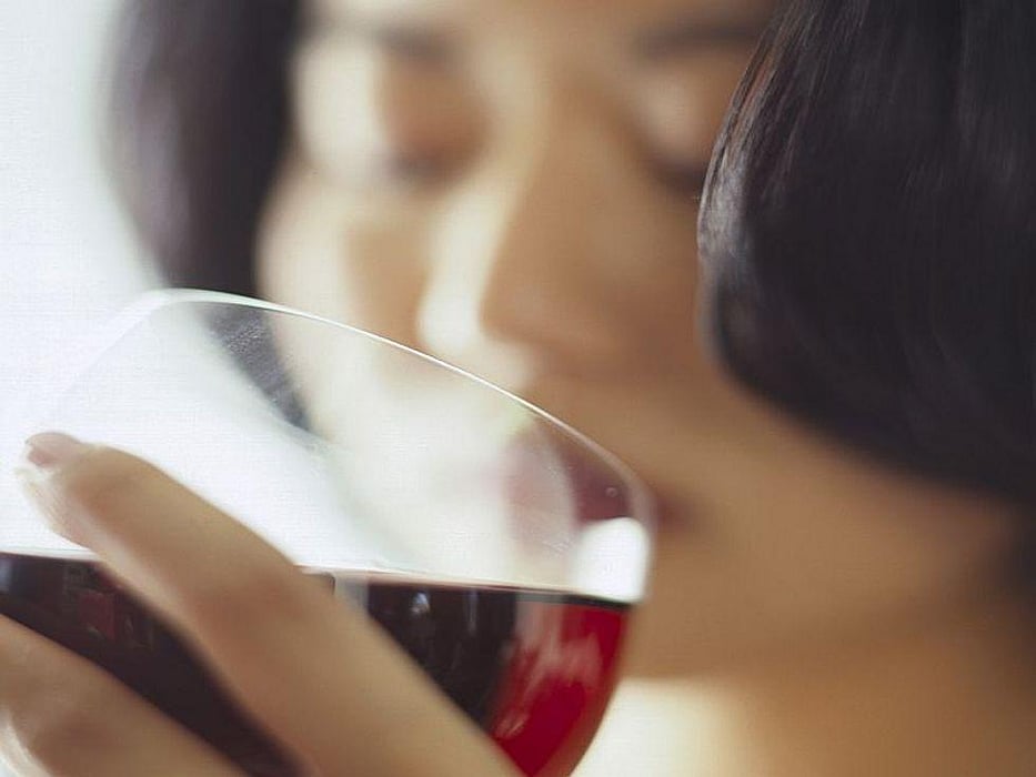 woman drinking red wine