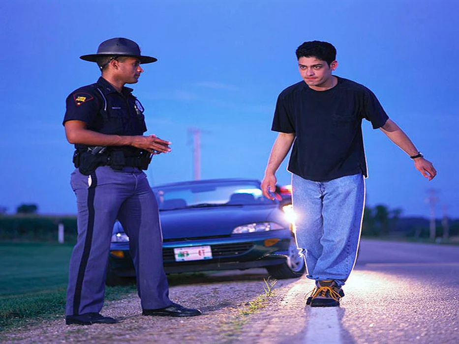 police officer checking for a drunk driver