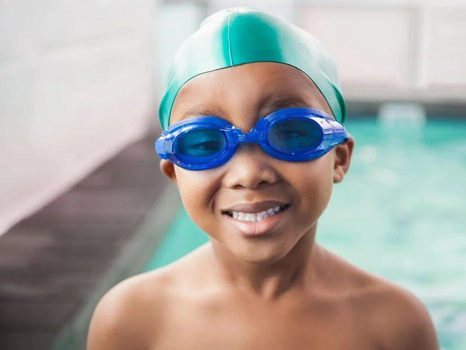 African American boy swimming