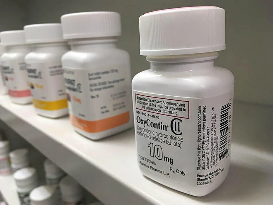 prescription pills containers on the shelve