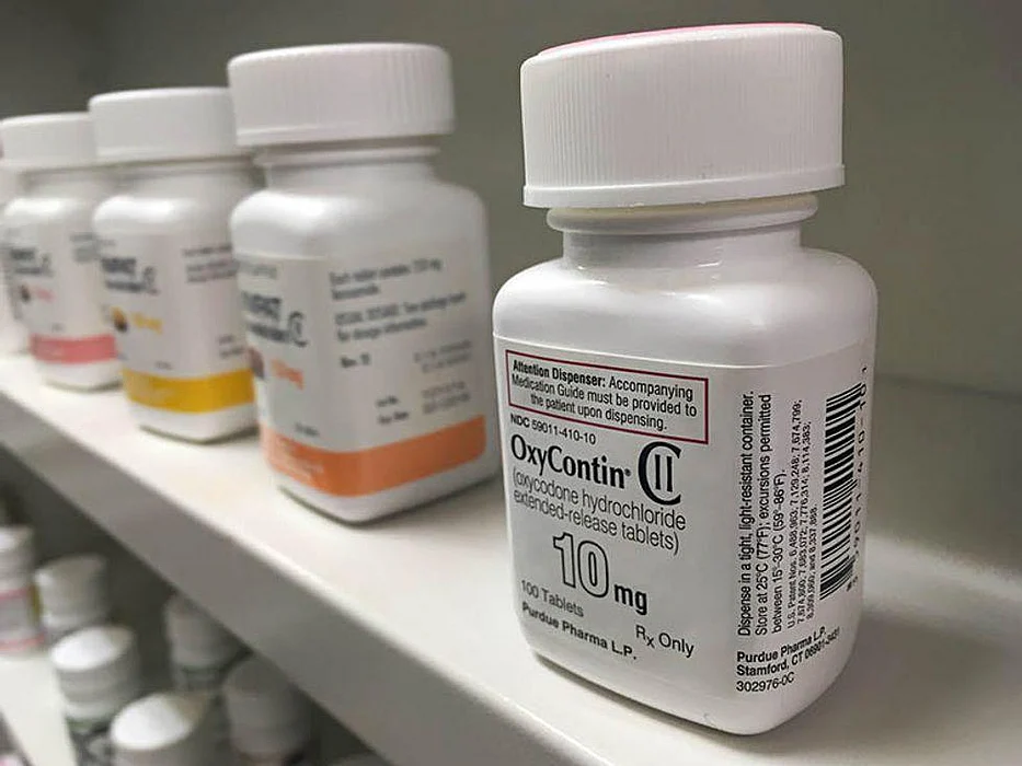 prescription pills containers on the shelve