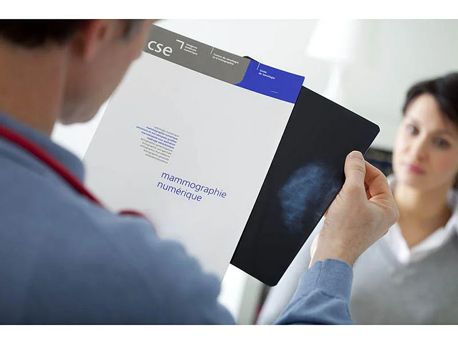 doctor reviewing mammogram