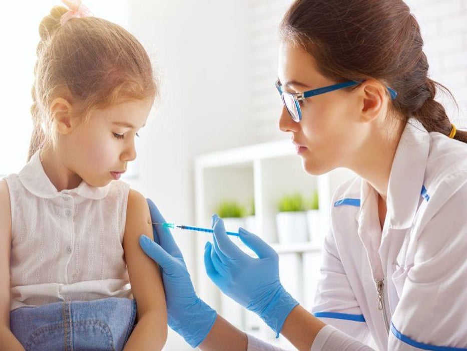 toddler getting vaccine