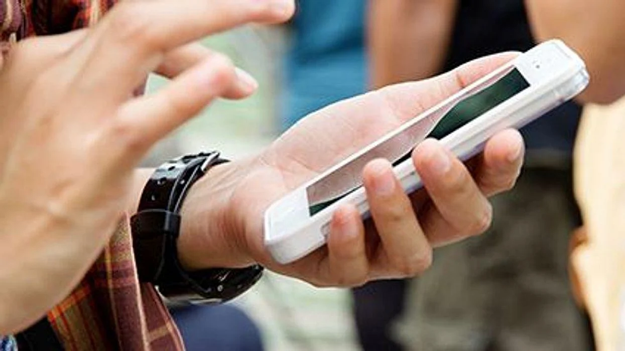 a person with a cell phone