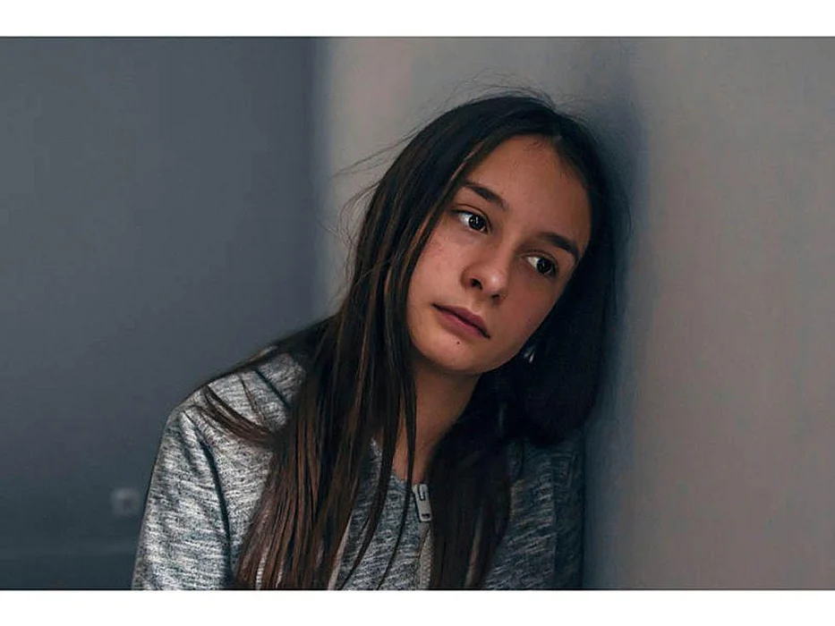 girl looking worried