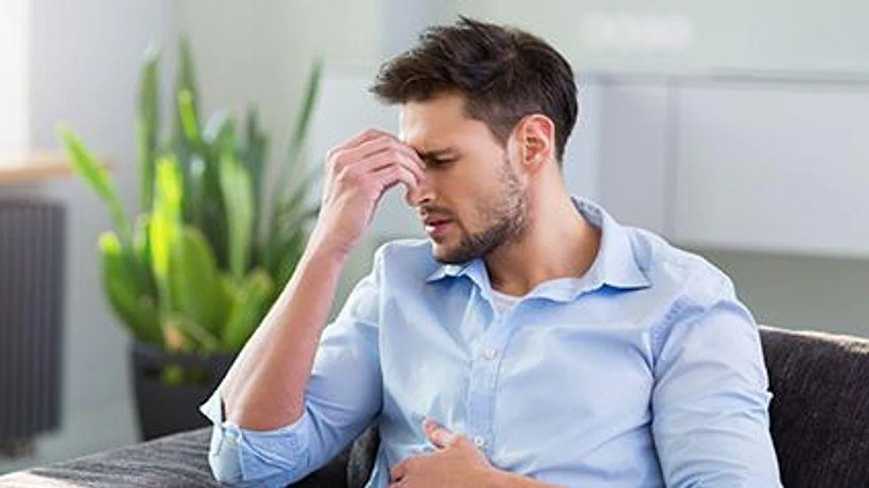 man showing the signs of stress