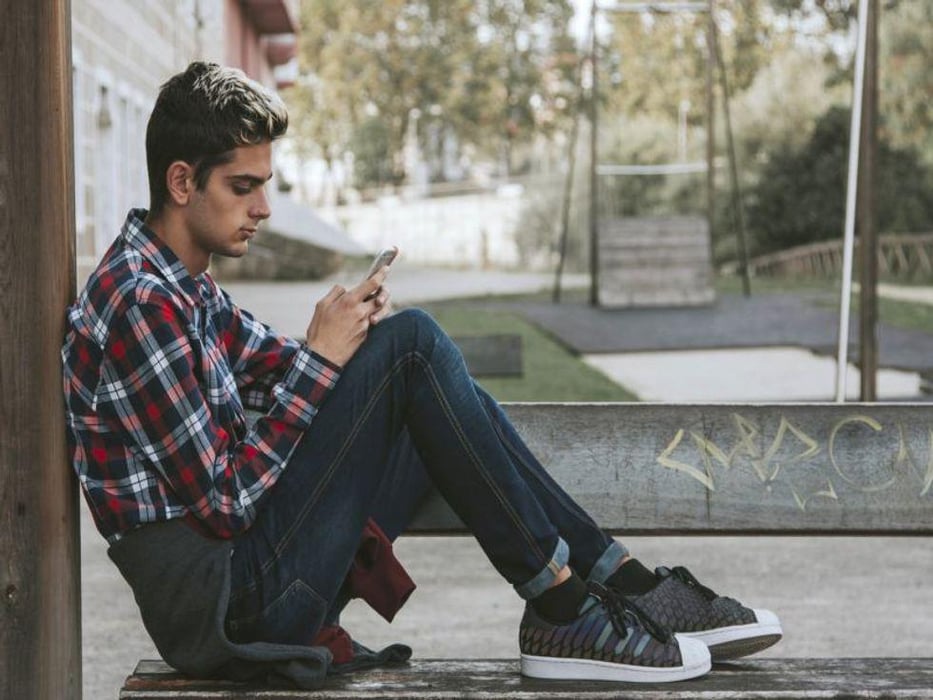 teen using phone
