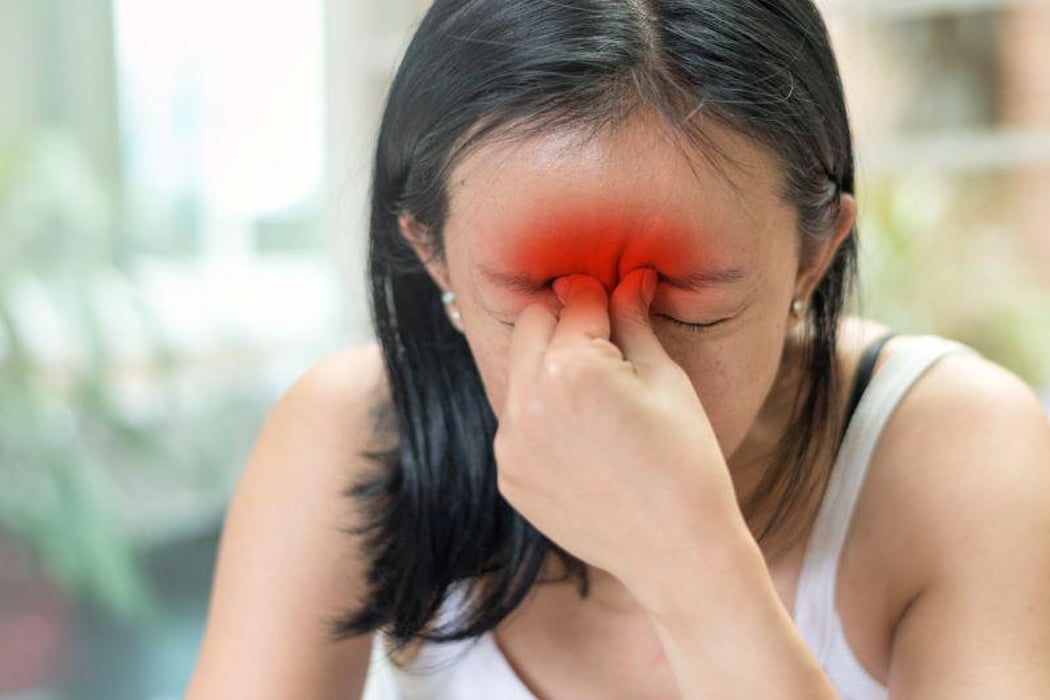 sinus pain migraine stress asian