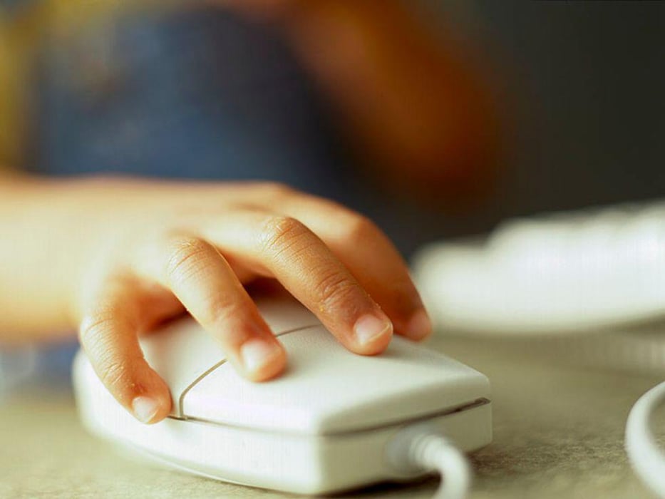child using computer mouse