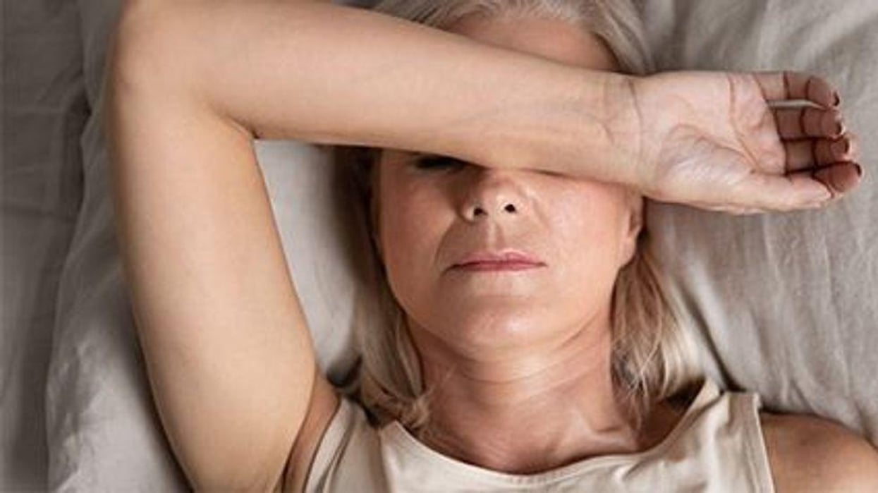 older woman with a headache