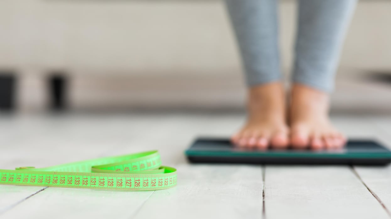 Unrecognizable Woman Standing On Weight-Scales Slimming At Home, Cropped, Panorama