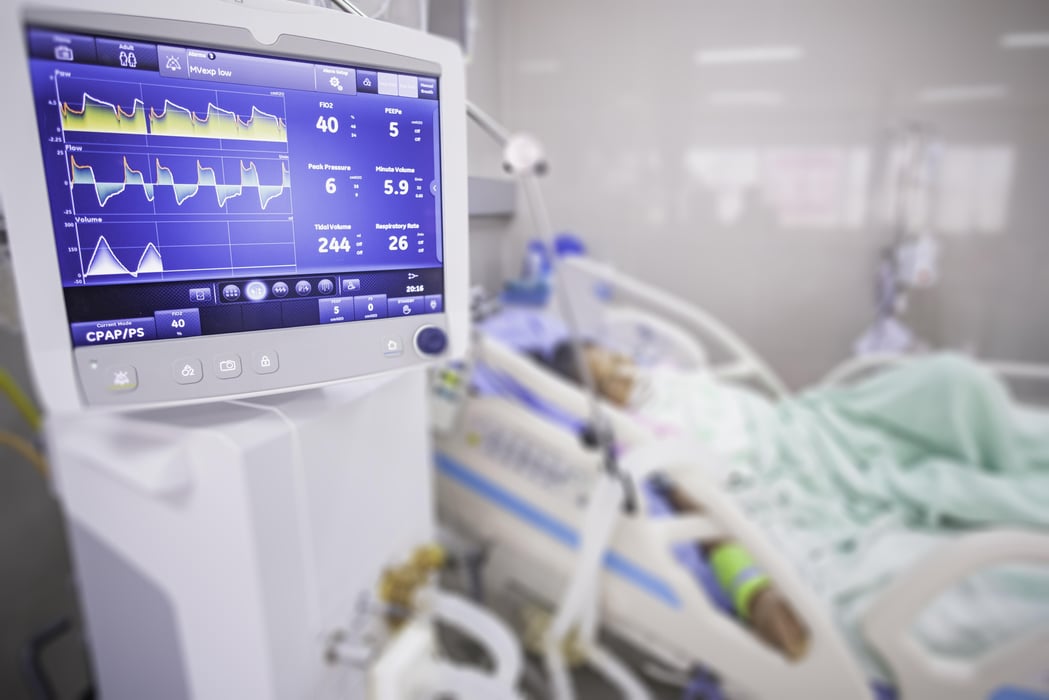 Ventilator monitor, given oxygen by intubation tube to patient, setting in ICU/Emergency room