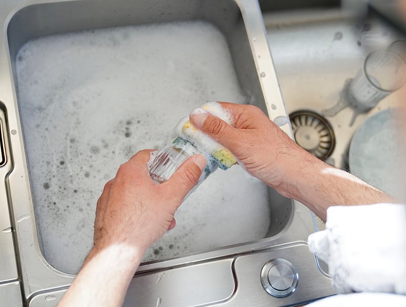 News Picture: Even Washing Dishes Helps an Older Woman's Heart