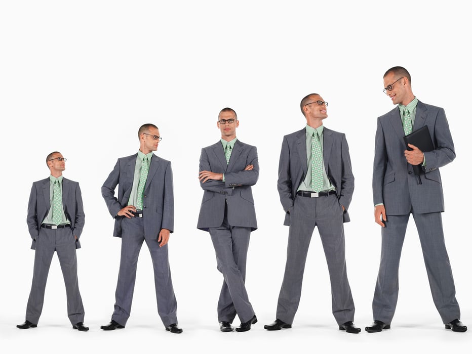 Row Of Businessmen In Ascending Order Of Height