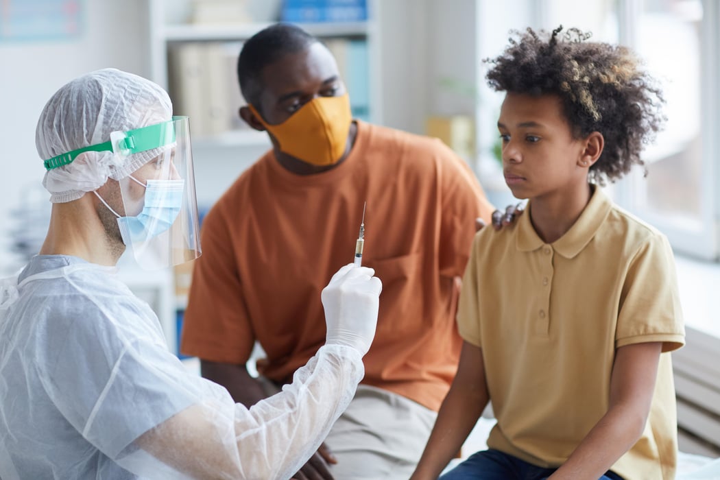 Scared African-American Boy in Vaccination Office