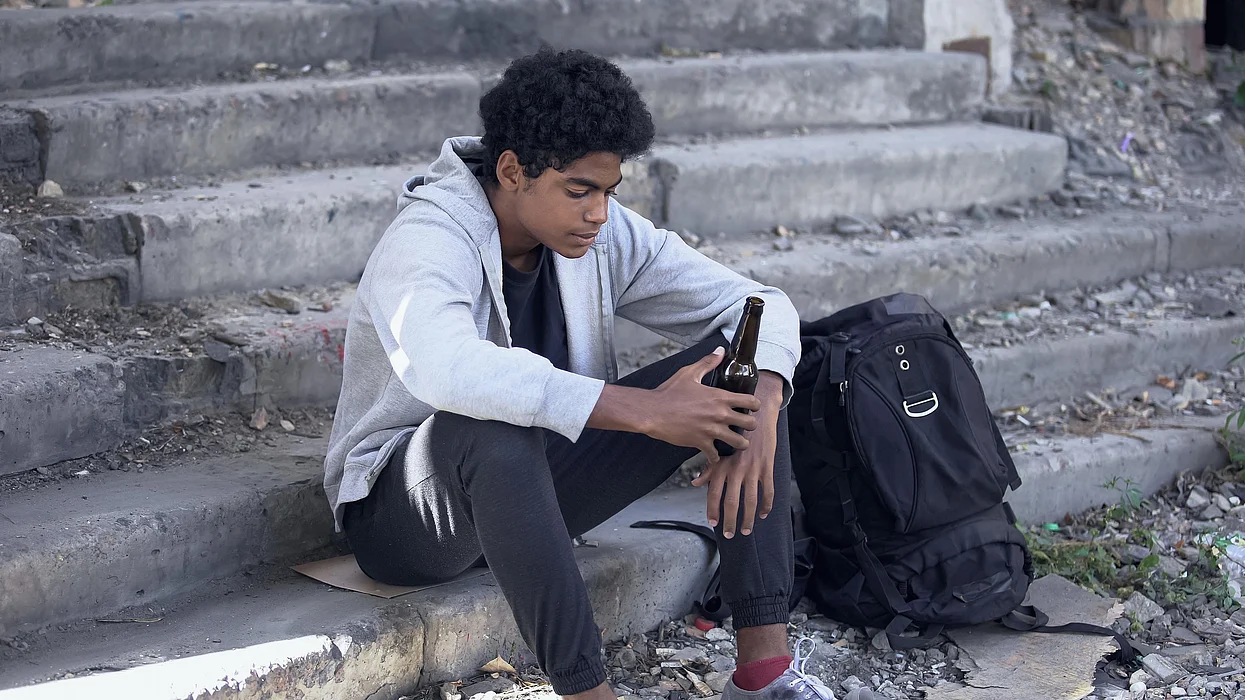 black teen drinking