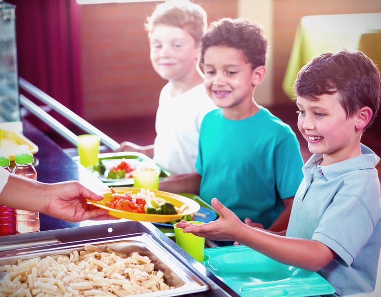 Better School Lunches Blunt U.S. Kids` Weight Gain