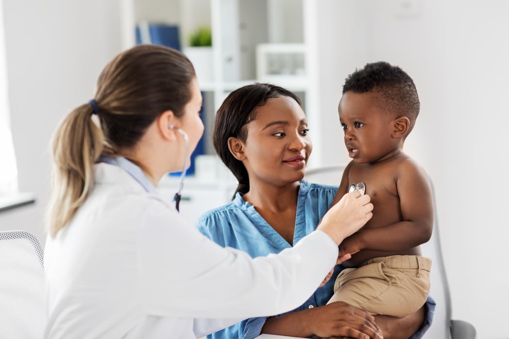 black child doctor pediatrician