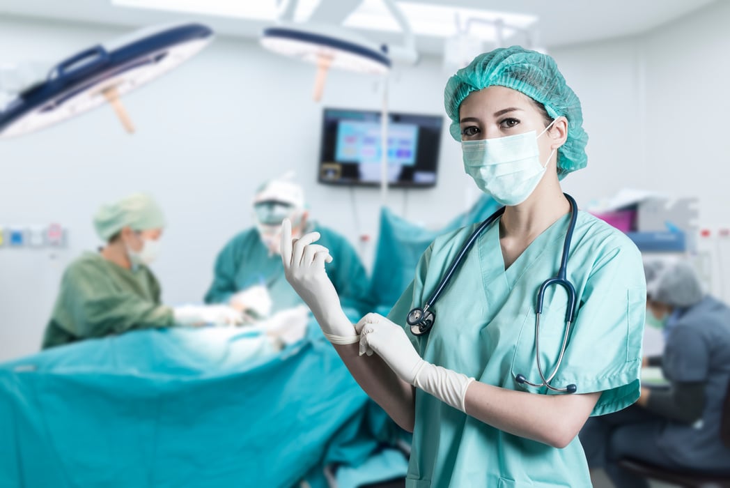 Asian doctor in operating room